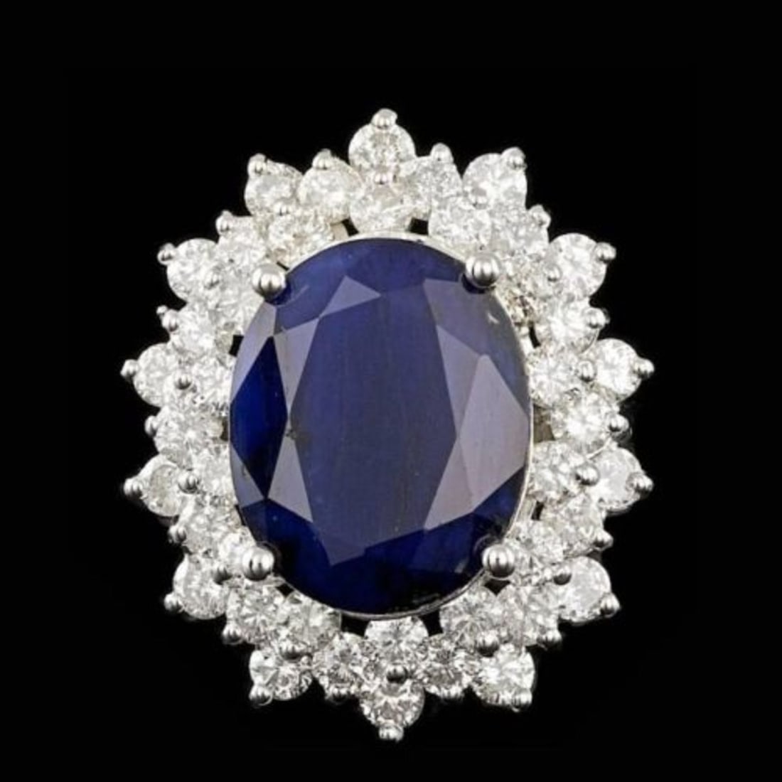14K White Gold 13.19ct Sapphire and 2.96ct Diamond Ring: Retail: $25,650.00 ****** 14K White Gold 13.19ct Sapphire and 2.96ct Diamond Ring ****** Metal: 14K White Gold / Total Item Weight: 10.5 Grams / Country Made: United States / / Main Stone: Sapphire