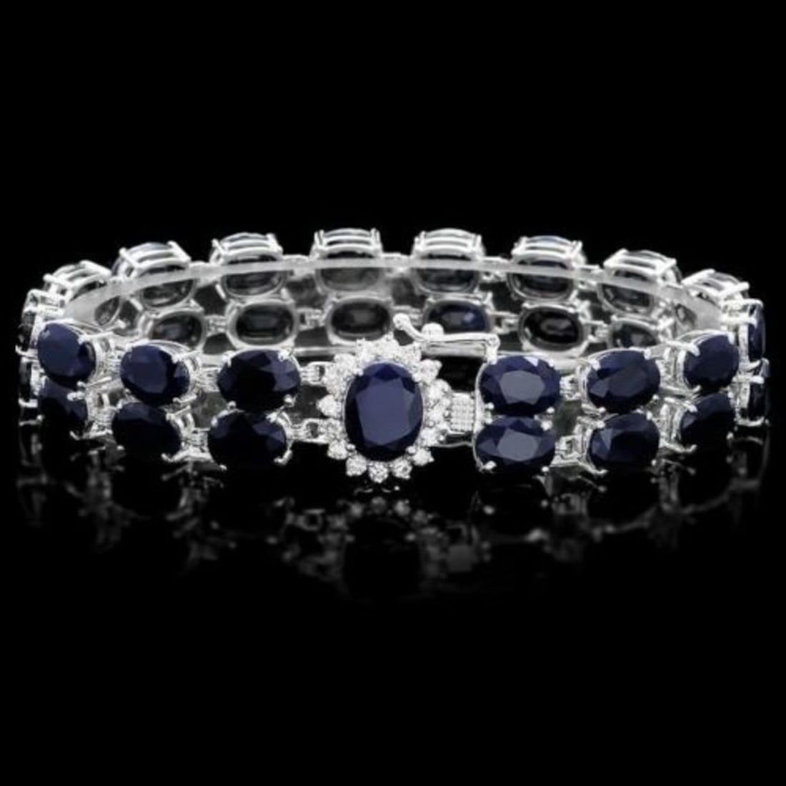 14K Gold 53.64ct Sapphire 0.63ct Diamond Bracelet: Retail: $18,625.00 ****** 14K Gold 53.64ct Sapphire 0.63ct Diamond Bracelet ****** Metal: 14K White Gold / Total Item Weight: 27.0 Grams / Country Made: United States / / Main Stone: Sapphire /