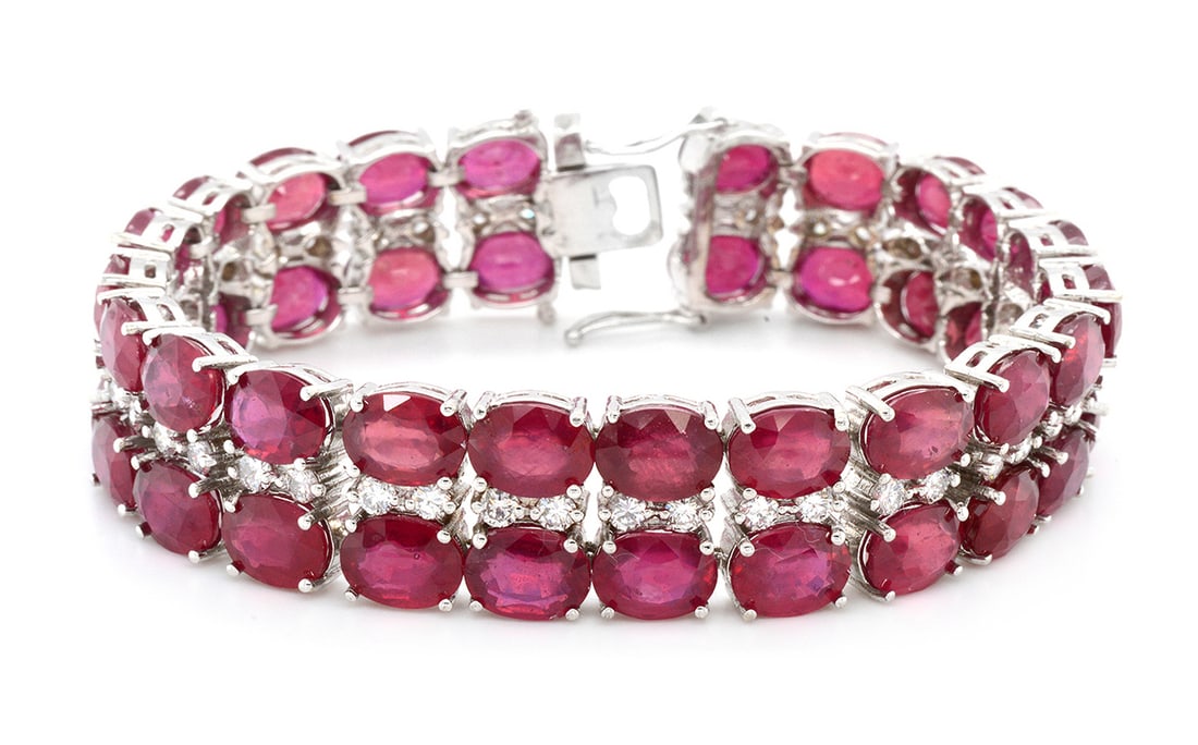 18K White Gold Ladies Bracelet with 78.17ct Ruby and 2.80ct tw Adjacent Diamonds: Retail: $27,000.00 ****** 18K White Gold Ladies Bracelet with 78.17ct Ruby and 2.80ct tw Adjacent Diamonds ****** Size: 7 / Metal: 18K White Gold / Total Item Weight: 50.3 Grams / Country Made:
