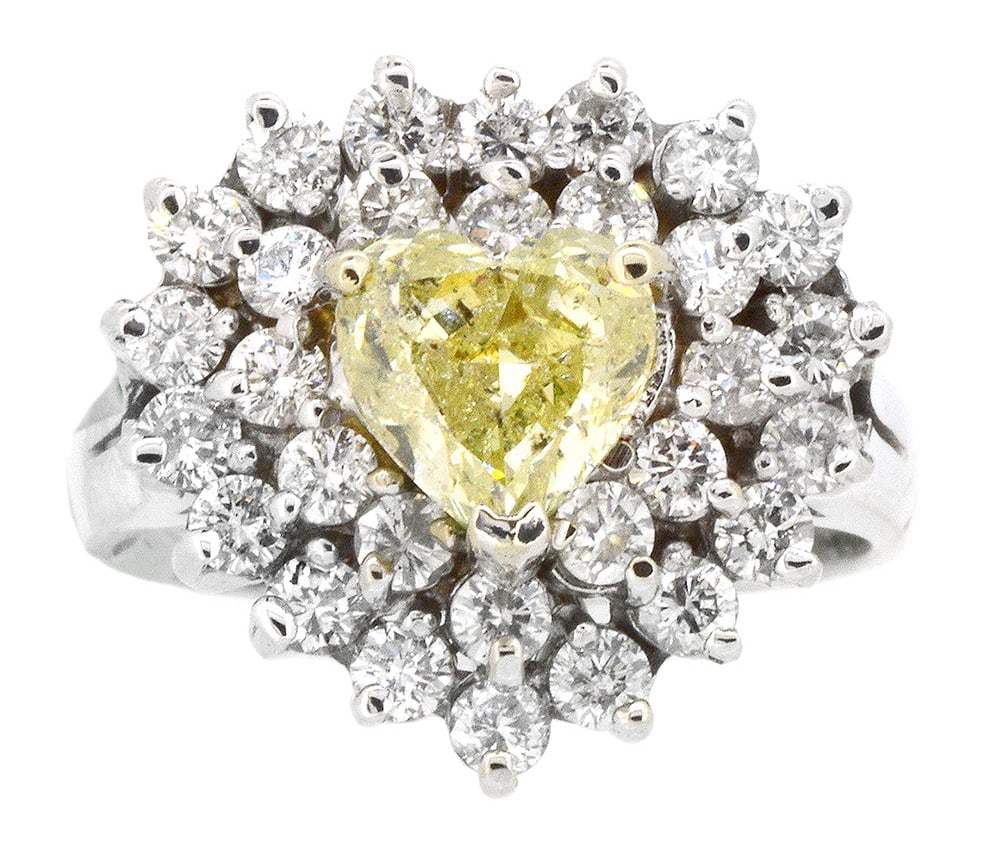18K White Gold Ladies Ring with 1.30ct GIA Certified Fancy Yellow Heart Shaped Diamond and 1.20ct tw: Retail: $19,000.00 ****** 18K White Gold Ladies Ring with 1.30ct GIA Certified Fancy Yellow Heart Shaped Diamond and 1.20ct tw Adjacent Diamonds ****** Size: 6.5 / Metal: 18K White Gold / Total Item
