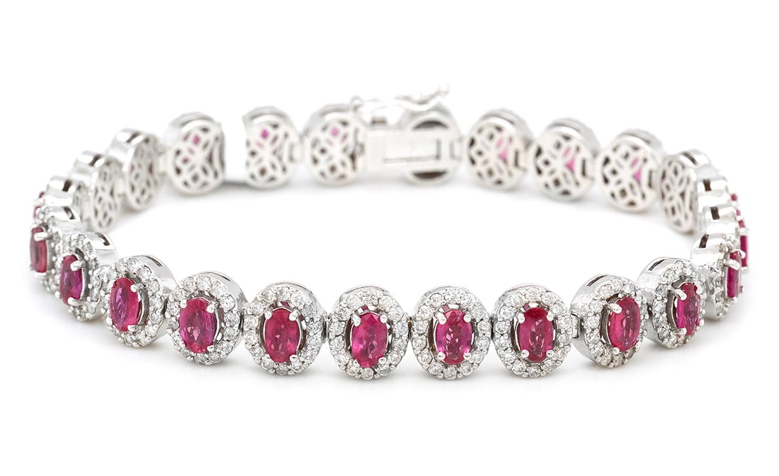 14K white Gold Ladies Bracelet with 6.45tcw Rubies and 3.60tcw Adjacent Diamonds: Retail: $19,500.00 ****** 14K white Gold Ladies Bracelet with 6.45tcw Rubies and 3.60tcw Adjacent Diamonds ****** Size: 7 / Metal: 14K White Gold / Total Item Weight: 21.4 Grams / Country Made: