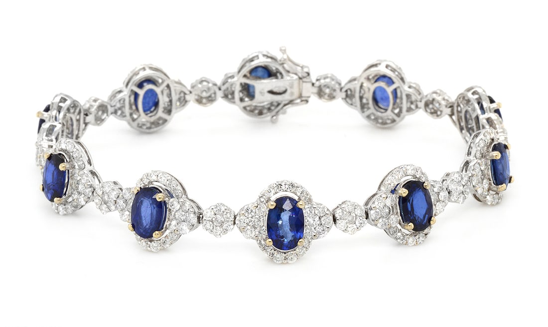 18K White Gold Ladies Bracelet with 9.09ct Sapphire and 5.90ct tw Adjacent Diamonds: Retail: $19,000.00 ****** 18K White Gold Ladies Bracelet with 9.09ct Sapphire and 5.90ct tw Adjacent Diamonds ****** Size: 7 / Metal: 18K White Gold / Total Item Weight: 15.8 Grams / Country Made: