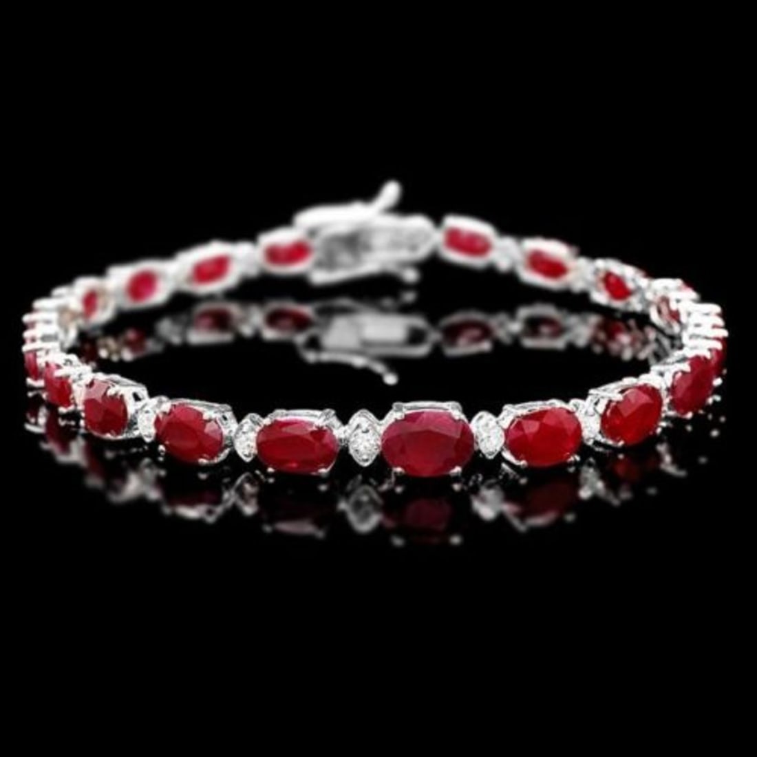 14K Gold 14.25ct Ruby 0.69ct Diamond Bracelet: Retail: $12,900.00 ****** 14K Gold 14.25ct Ruby 0.69ct Diamond Bracelet ****** Metal: 14K White Gold / Total Item Weight: 10.5 Grams / Country Made: United States / / Main Stone: Ruby / Color: Red / C