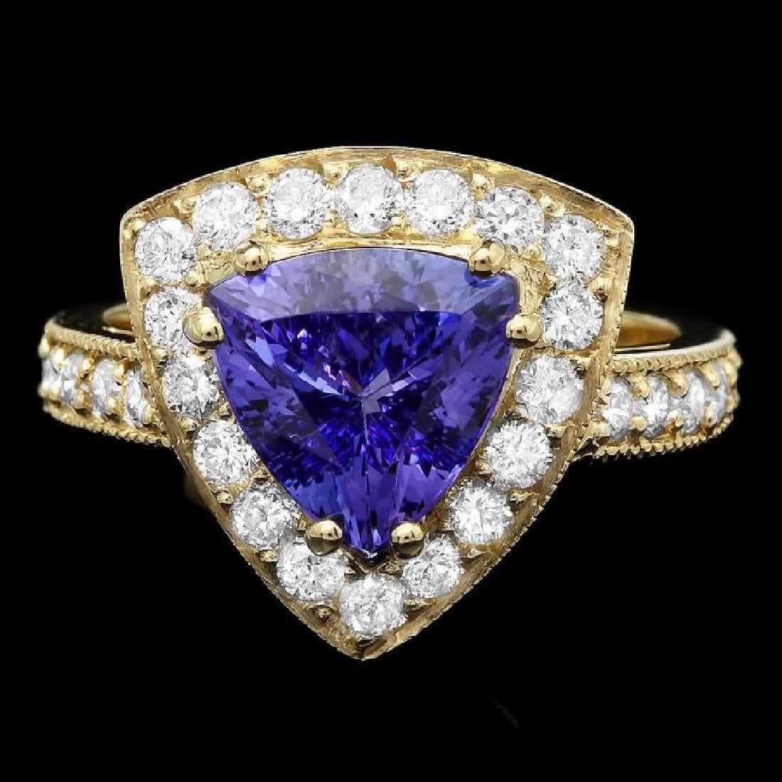 14K Yellow Gold 2.92ct Tanzanite and 1.01ct Diamond Ring: Retail: $8,792.00 ****** 14K Yellow Gold 2.92ct Tanzanite and 1.01ct Diamond Ring ****** Metal: 14K Yellow Gold / Total Item Weight: 5.3 Grams / Country Made: United States / / Main Stone: Tanzanite