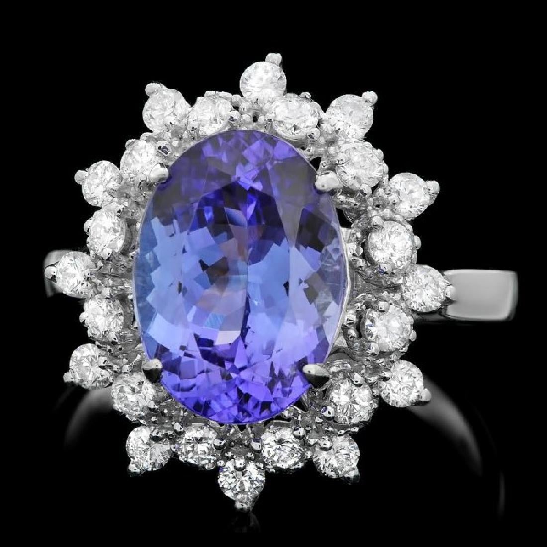 14K White Gold 3.37ct Tanzanite and 0.72ct Diamond Ring: Retail: $8,201.00 ****** 14K White Gold 3.37ct Tanzanite and 0.72ct Diamond Ring ****** Metal: 14K White Gold / Total Item Weight: 4.0 Grams / Country Made: United States / / Main Stone: Tanzanite /