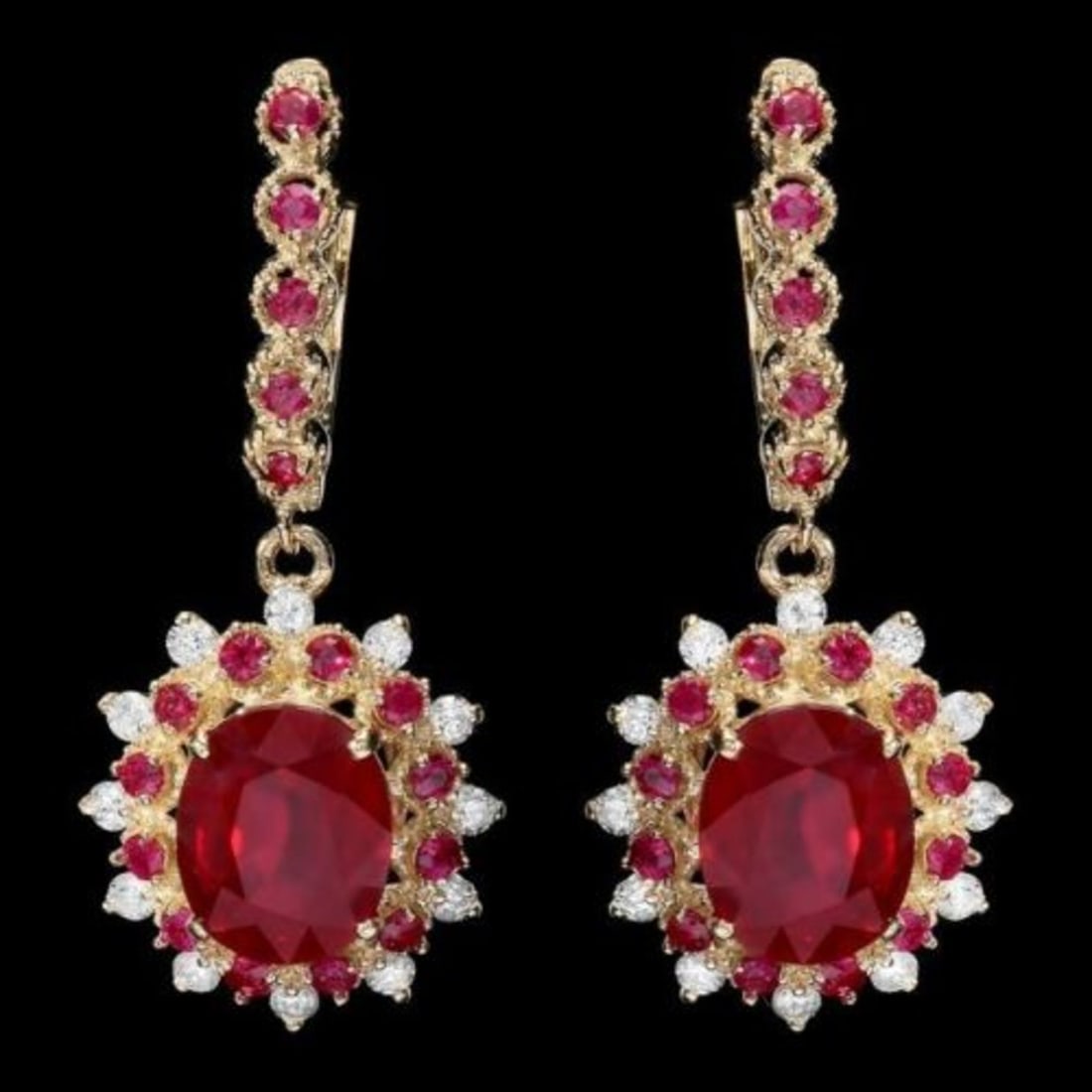 14K Gold 8.07ct Ruby and 0.70ct diamond Earrings: Retail: $8,687.00 ****** 14K Gold 8.07ct Ruby and 0.70ct diamond Earrings ****** Metal: 14K Yellow Gold / Total Item Weight: 8.0 Grams / Country Made: United States / / Main Stone: Ruby / Color: Red /