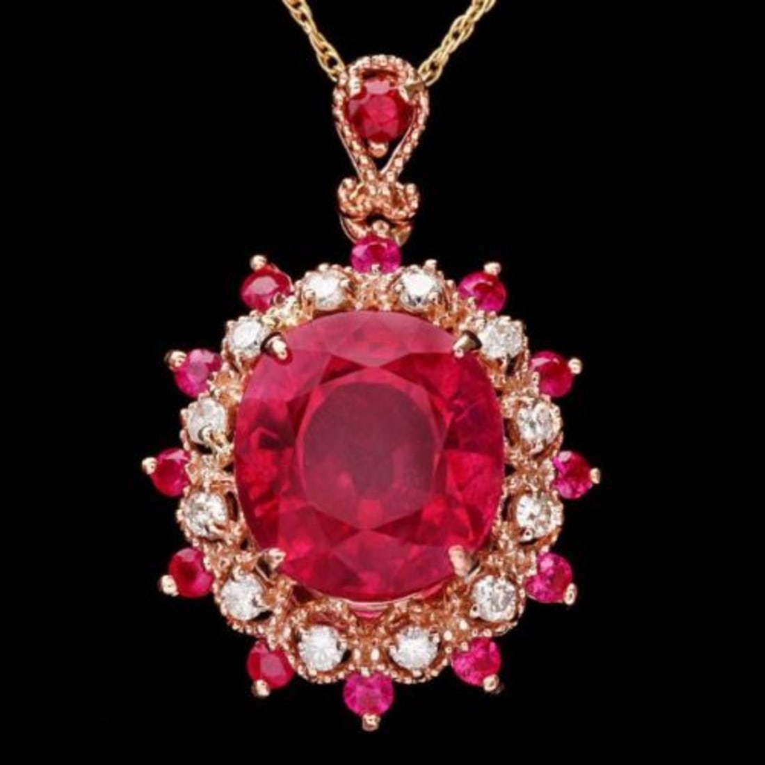 14K Gold 6.97ct Ruby 0.21ct Diamond Pendant: Retail: $4,880.00 ****** 14K Gold 6.97ct Ruby 0.21ct Diamond Pendant ****** Metal: 14K Rose Gold / Total Item Weight: 4.0 Grams / Country Made: United States / / Main Stone: Ruby / Color: Red / Carat