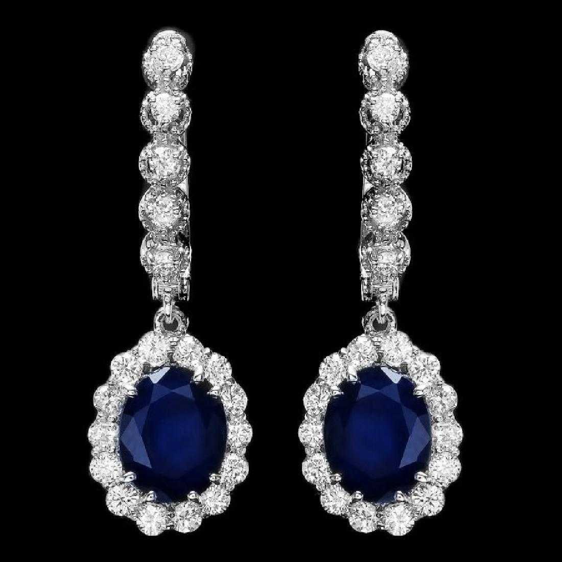 14K White Gold 5.32ct Sapphire and 1.06ct Diamond Earrings: Retail: $6,733.00 ****** 14K White Gold 5.32ct Sapphire and 1.06ct Diamond Earrings ****** Metal: 14K White Gold / Total Item Weight: 5.6 Grams / Country Made: United States / / Main Stone: Sapphire /