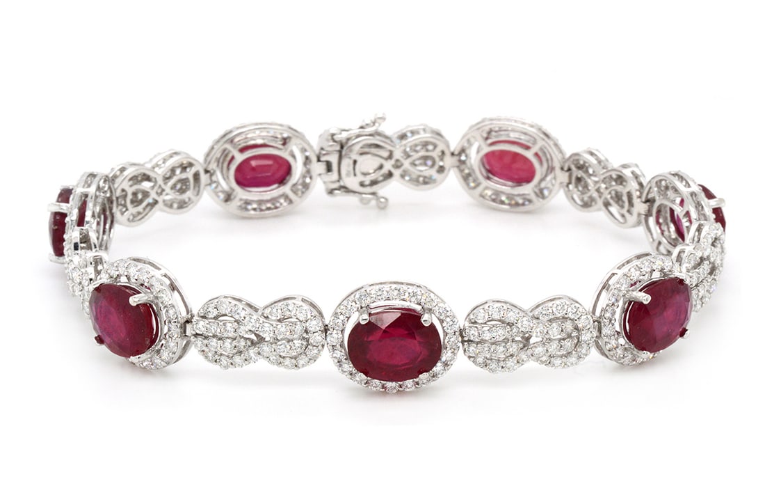 18K White Gold Ladies Bracelet with 17.81ct Ruby and 4.76ct tw Diamonds: Retail: $19,000.00 ****** 18K White Gold Ladies Bracelet with 17.81ct Ruby and 4.76ct tw Diamonds ****** Size: 7 / Metal: 18K White Gold / Total Item Weight: 18.3 Grams / Country Made: United States /