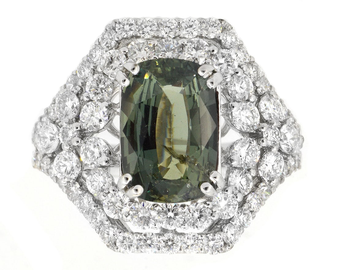 18K White Gold Ladies Ring with 2.71 Natural Unheated Sapphire and 1.77tw Diamonds: Retail: $12,000.00 ****** 18K White Gold Ladies Ring with 2.71 Natural Unheated Sapphire and 1.77tw Diamonds ****** Size: 6.5 / Metal: 18K White Gold / Total Item Weight: 6 Grams / Country Made: Unite