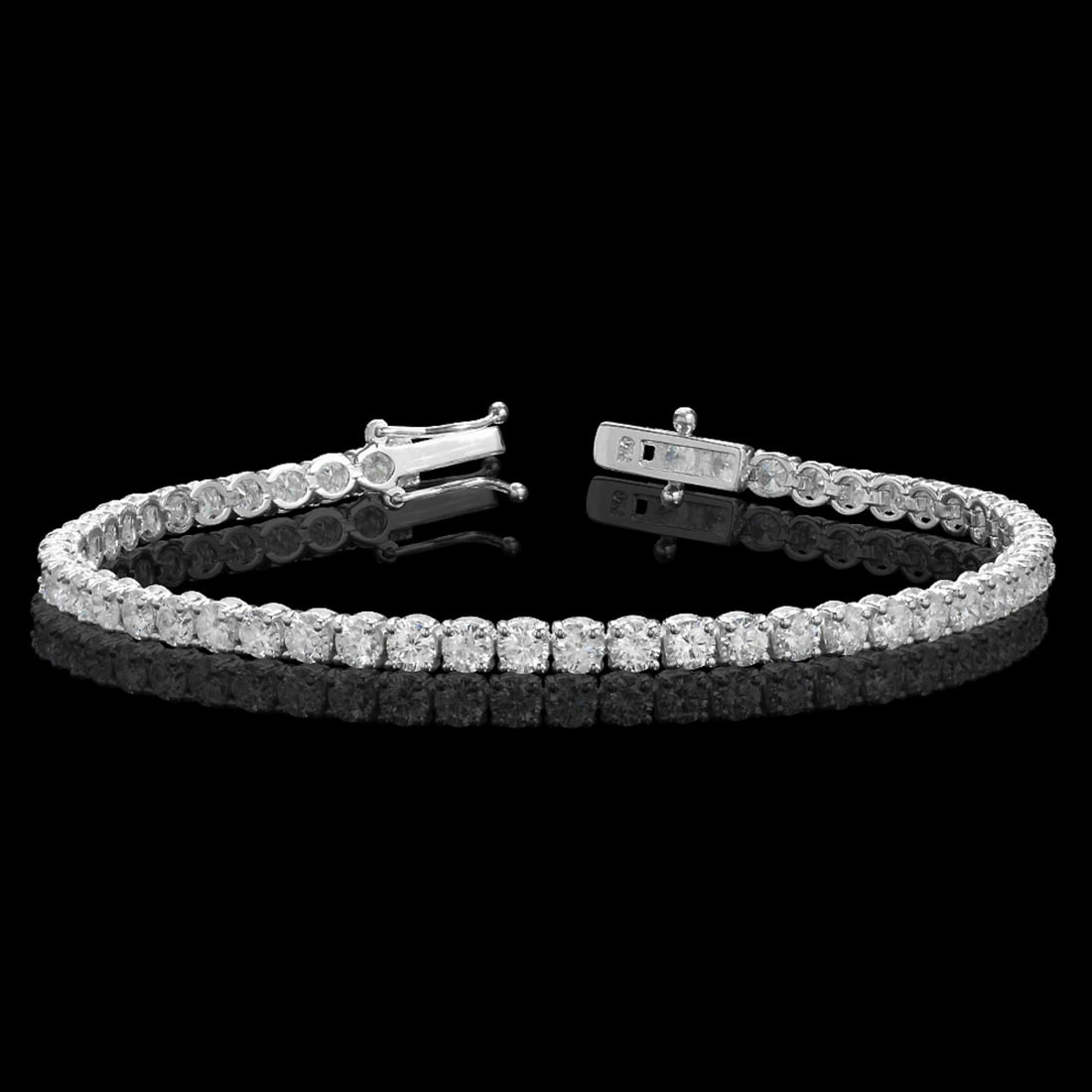 18k White Gold 6.71ct Diamond Bracelet: Retail: $25,263.00 ****** 18k White Gold 6.71ct Diamond Bracelet ****** Metal: 18K White Gold / Total Item Weight: 10.7 grams / Country Made: United States / / Main Stone: Diamond / Carat Total