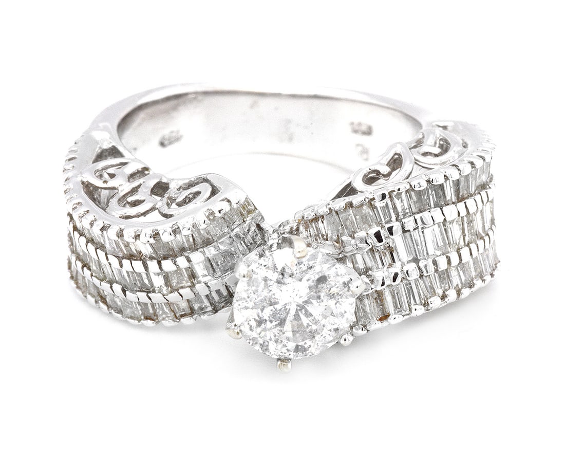 18K White Gold Ladies Ring with 1.25ct Center and 2.11ct Adjacent Diamonds: Retail: $9,500.00 ****** 18K White Gold Ladies Ring with 1.25ct Center and 2.11ct Adjacent Diamonds ****** Size: 6.5 / Metal: 18K White Gold / Total Item Weight: 10.89 Grams / Country Made: United