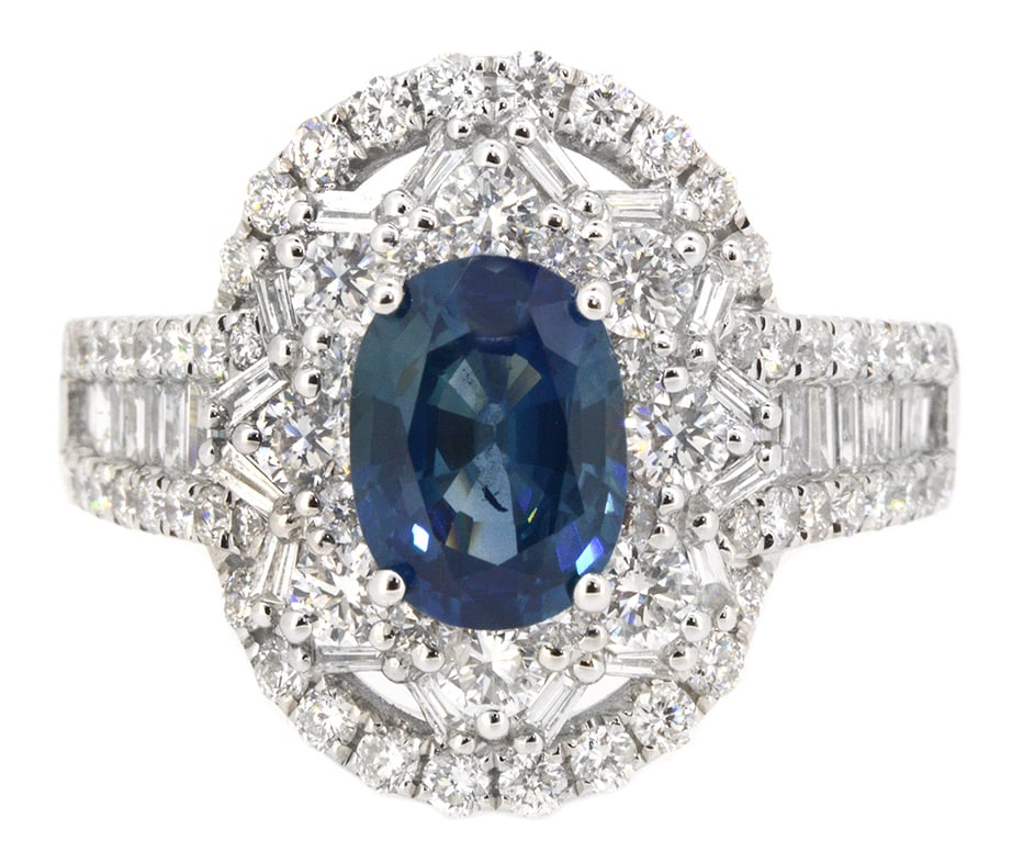 18K White Gold Ladies Ring with 1.78ct Blue Sapphire and 1.64ct tw Adjacent Diamonds: Retail: $9,000.00 ****** 18K White Gold Ladies Ring with 1.78ct Blue Sapphire and 1.64ct tw Adjacent Diamonds ****** Size: 6.5 / Metal: 18K White Gold / Total Item Weight: 7.6 Grams / Country Made: Un