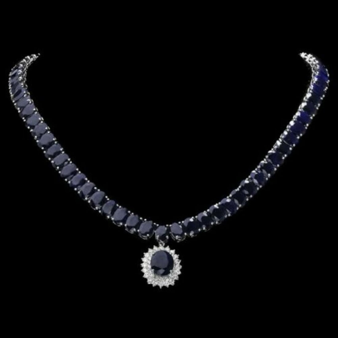 14K White Gold 104.87ct Sapphire and 1.60ct Diamond Necklace: Retail: $36,734.00 ****** 14K White Gold 104.87ct Sapphire and 1.60ct Diamond Necklace ****** Size: 18 with .75" pendant / Metal: 14K White Gold / Total Item Weight: 51.0 Grams / Country Made: United