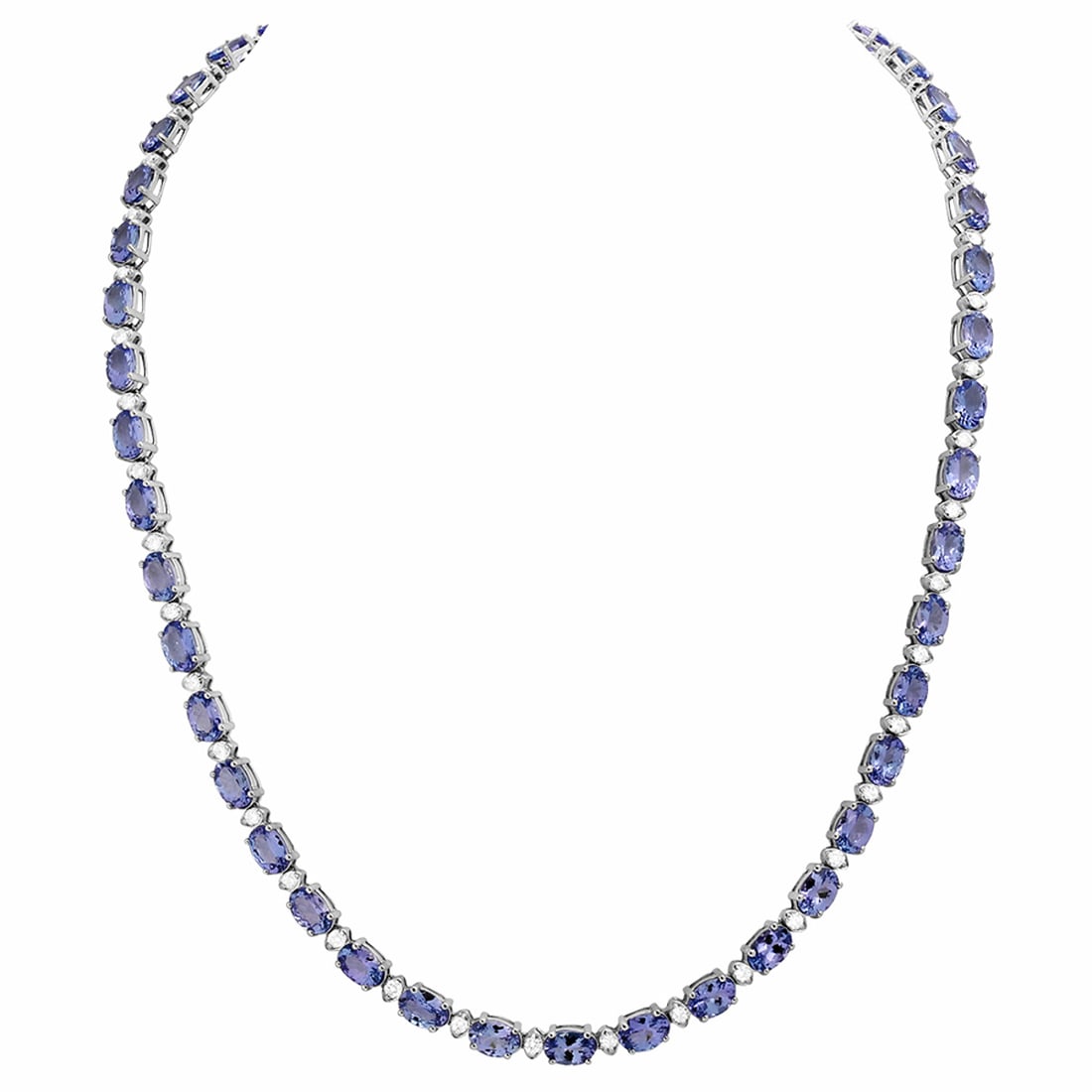 14k White Gold 28.80ct Tanzanite 1.73ct Diamond Necklace: Retail: $21,750.00 ****** 14k White Gold 28.80ct Tanzanite 1.73ct Diamond Necklace ****** Metal: 14K White Gold / Total Item Weight: 23.40 grams / Country Made: United States / / Main Stone: Tanzanite