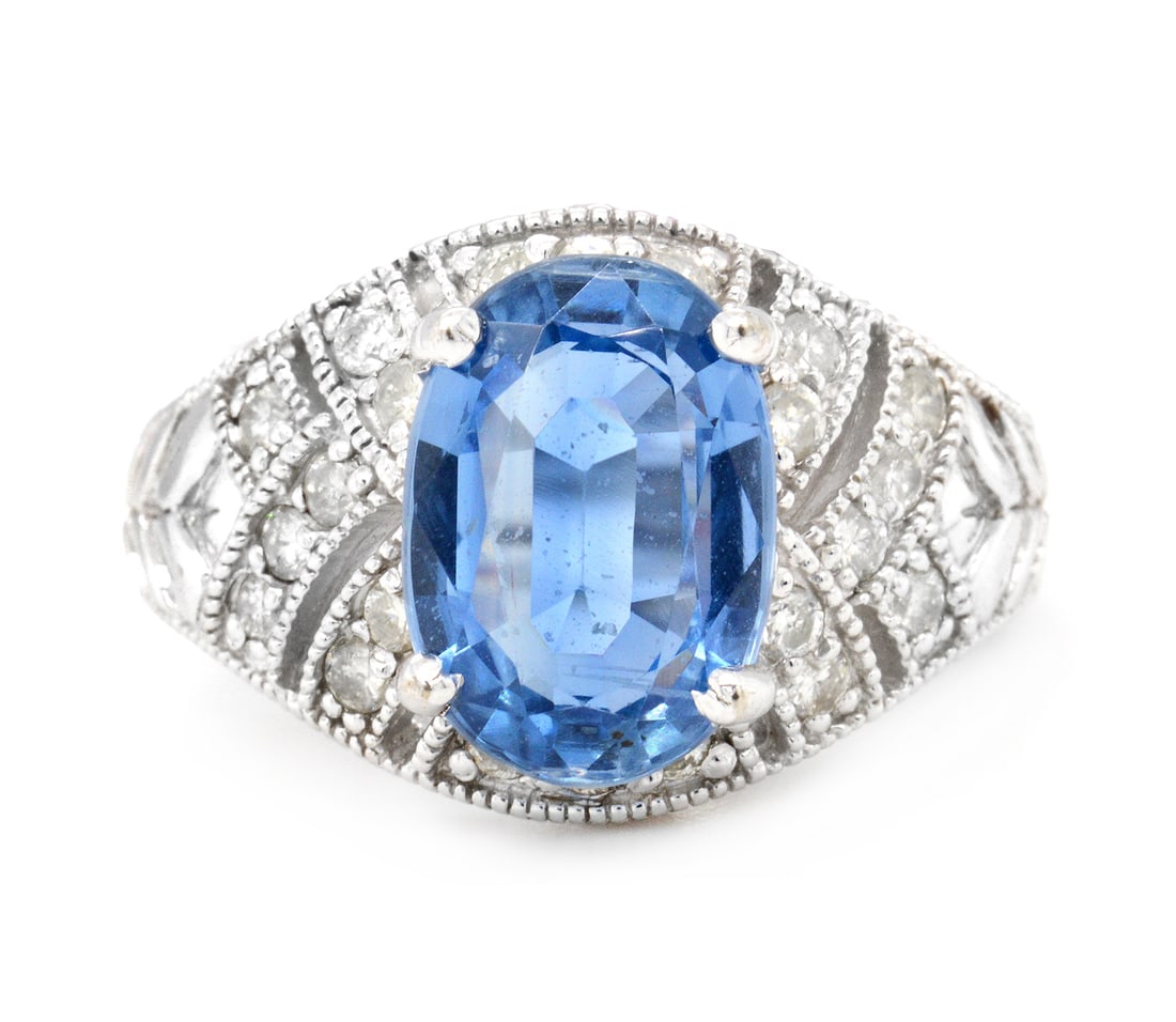 14K White Gold Ladies Ring with 3.60ct Kyanite and 0.35tcw Adjacent Diamonds: Retail: $6,500.00 ****** 14K White Gold Ladies Ring with 3.60ct Kyanite and 0.35tcw Adjacent Diamonds ****** Size: 6.5 / Metal: 14K White Gold / Total Item Weight: 7.8 Grams / Country Made: United Sta