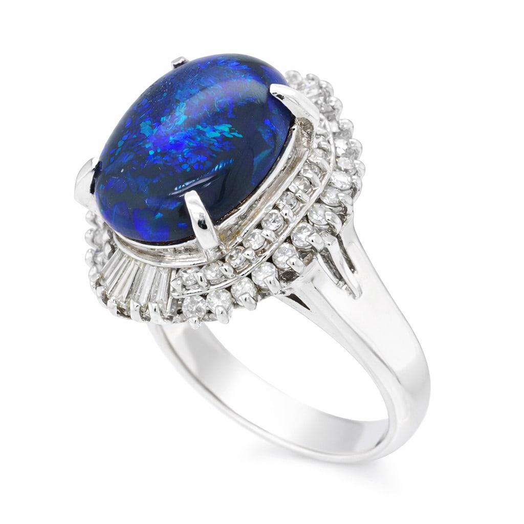 Platinum Ladies Ring with 4.02ct Black Opal and 0.72tcw Adjacent Diamonds: Retail: $12,390.00 ****** Platinum Ladies Ring with 4.02ct Black Opal and 0.72tcw Adjacent Diamonds ****** Size: 6.5 (we offer free resizing to winning bidders) / Metal: Platinum / Total Item Weight: