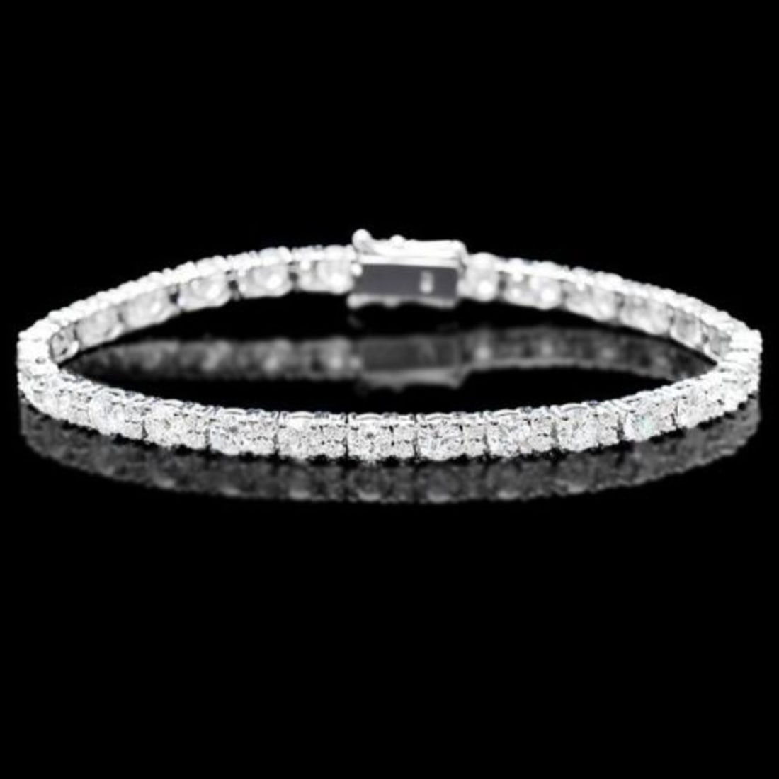 18K Gold 8.69ct Diamond Bracelet: Retail: $33,800.00 ****** 18K Gold 8.69ct Diamond Bracelet ****** Metal: 18K White Gold / Total Item Weight: 11.0 Grams / Country Made: United States / / Main Stone: Diamond / Carat Total Weight: 8.69