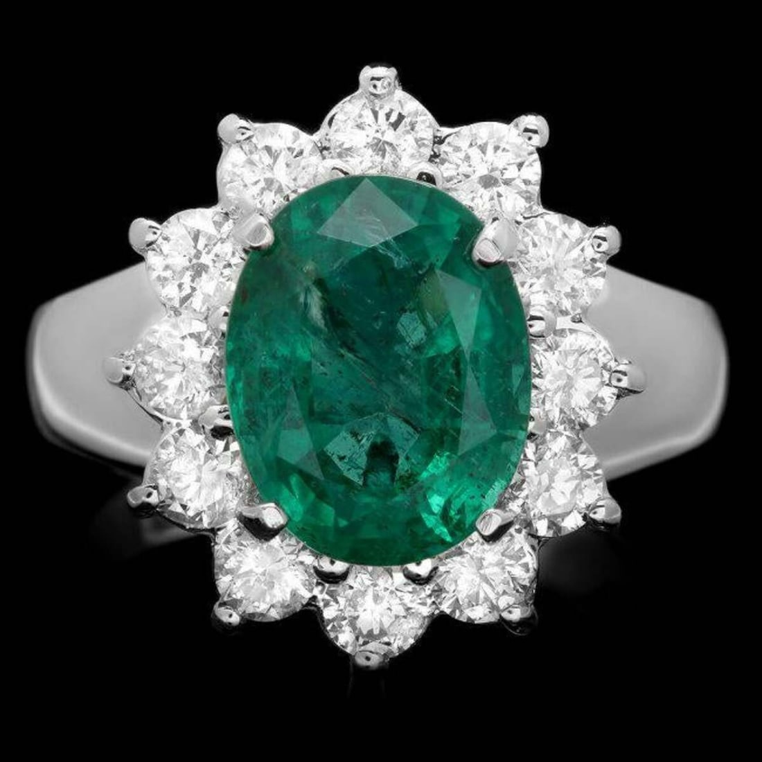 14K White Gold 3.47ct Emerald and 1.02ct Diamond Ring: Retail: $14,962.00 ****** 14K White Gold 3.47ct Emerald and 1.02ct Diamond Ring ****** Metal: 14K White Gold / Total Item Weight: 7.0 Grams / Country Made: United States / / Main Stone: Emerald / Colo