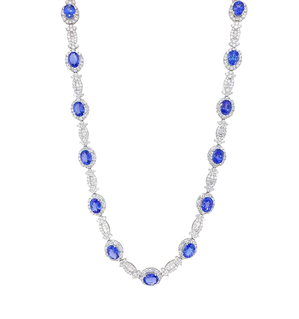 18K White Gold Ladies Necklace with 23.81ct tw Tanzanite and 15.40ct tw Adjacent Diamonds: Retail: $60,000.00 ****** 18K White Gold Ladies Necklace with 23.81ct tw Tanzanite and 15.40ct tw Adjacent Diamonds ****** Size: 18 Long / Metal: 18K White Gold / Total Item Weight: 41.3 / Country Mad