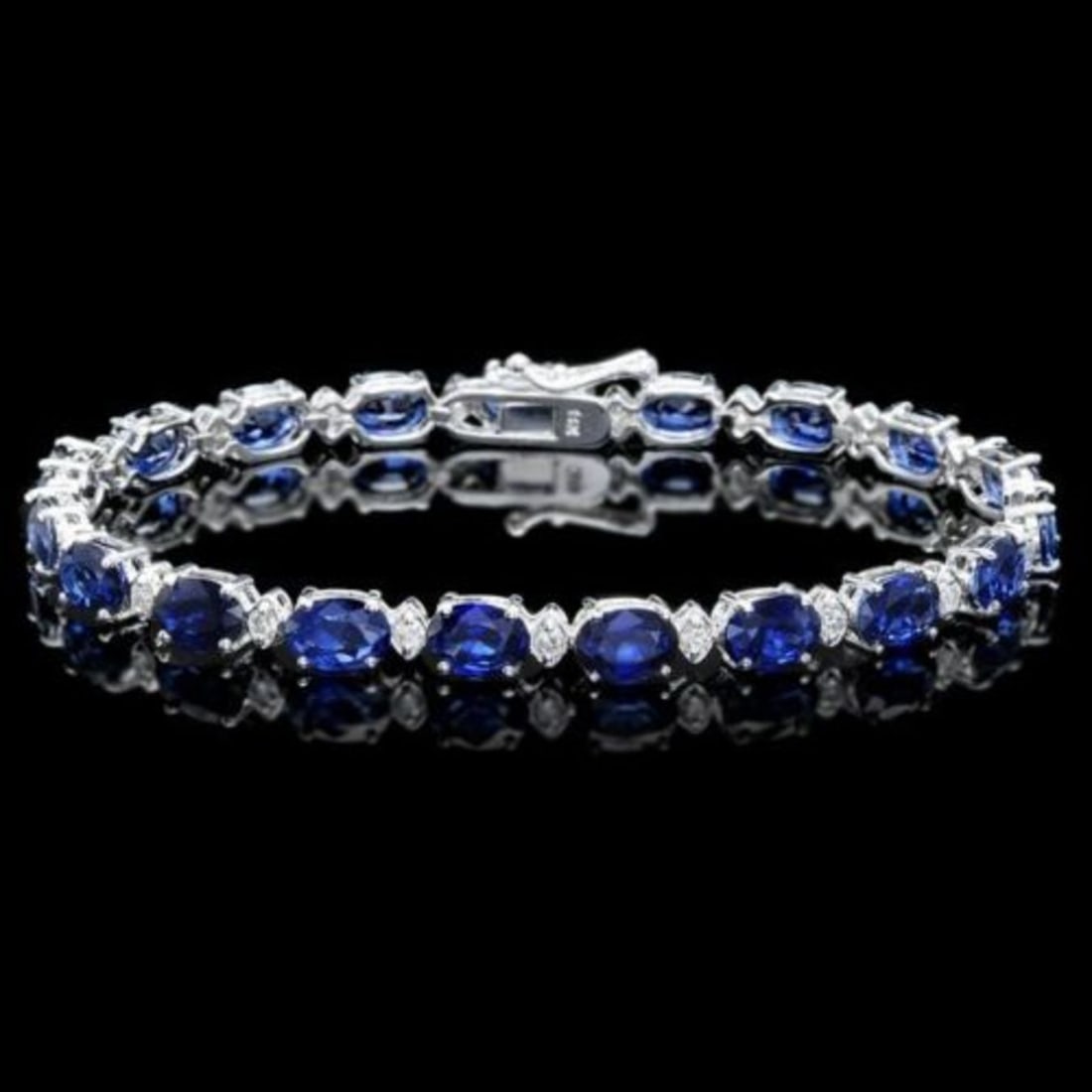 14K Gold 15.31ct Sapphire 0.62ct Diamond Bracelet: Retail: $9,725.00 ****** 14K Gold 15.31ct Sapphire 0.62ct Diamond Bracelet ****** Metal: 14K White Gold / Total Item Weight: 11.0 Grams / Country Made: United States / / Main Stone: Sapphire / Color: 