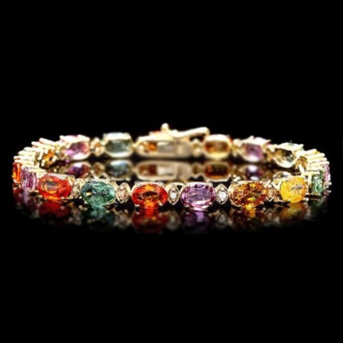 14K Gold 14.78ct Sapphire 0.66ct Diamond Bracelet: Retail: $12,776.00 ****** 14K Gold 14.78ct Sapphire 0.66ct Diamond Bracelet ****** Metal: 14K Yellow Gold / Total Item Weight: 11.0 Grams / Country Made: United States / / Main Stone: Sapphire / Color