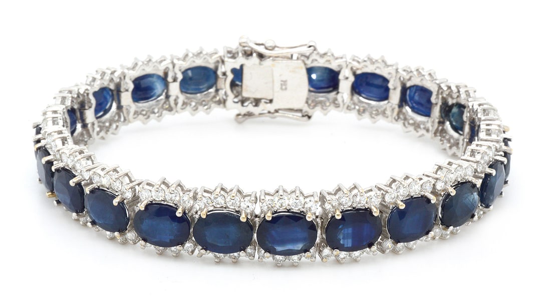 18K White Gold Bracelet with 34.79ct Sapphire and 4.97ct Diamonds: Retail: $23,000.00 ****** 18K White Gold Bracelet with 34.79ct Sapphire and 4.97ct Diamonds ****** Size: 7 / Metal: 18K White Gold / Total Item Weight: 36.4 Grams / Country Made: United States / / Mai