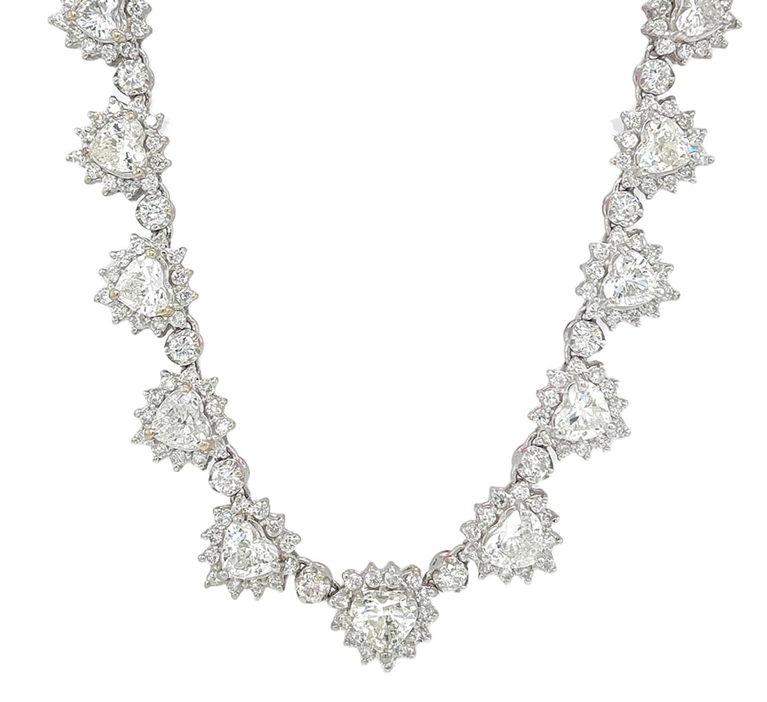 18K White Gold Ladies Necklace with 5.74ct tw Heart Shaped Diamonds and 6.92ct tw Adjacent Diamonds: Retail: $59,000.00 ****** 18K White Gold Ladies Necklace with 5.74ct tw Heart Shaped Diamonds and 6.92ct tw Adjacent Diamonds ****** Size: 17 / Metal: 18K White Gold / Total Item Weight: 30.5 Grams / 