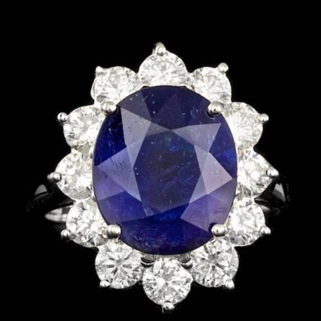 14K White Gold 6.85ct Sapphire and 1.99ct Diamond Ring: Retail: $16,210.00 ****** 14K White Gold 6.85ct Sapphire and 1.99ct Diamond Ring ****** Metal: 14K White Gold / Total Item Weight: 6.5 Grams / Country Made: United States / / Main Stone: Sapphire / Co