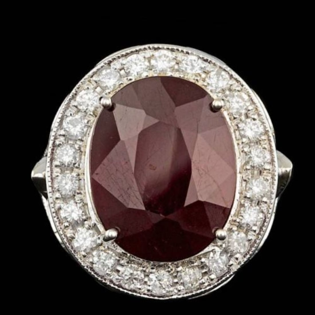 14K White Gold 12.69ct Ruby and 1.91ct Diamond Ring: Retail: $19,030.00 ****** 14K White Gold 12.69ct Ruby and 1.91ct Diamond Ring ****** Metal: 14K White Gold / Total Item Weight: 9.7 Grams / Country Made: United States / / Main Stone: Ruby / Color: Re