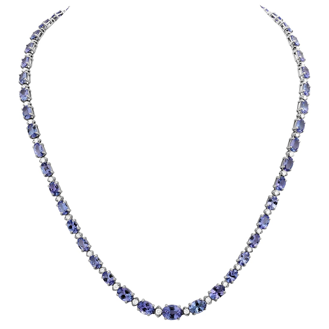 14k White Gold 23.93ct Tanzanite 1.14ct Diamond Necklace: Retail: $18,500.00 ****** 14k White Gold 23.93ct Tanzanite 1.14ct Diamond Necklace ****** Metal: 14K White Gold / Total Item Weight: 20.80 grams / Country Made: United States / / Main Stone: Tanzanite