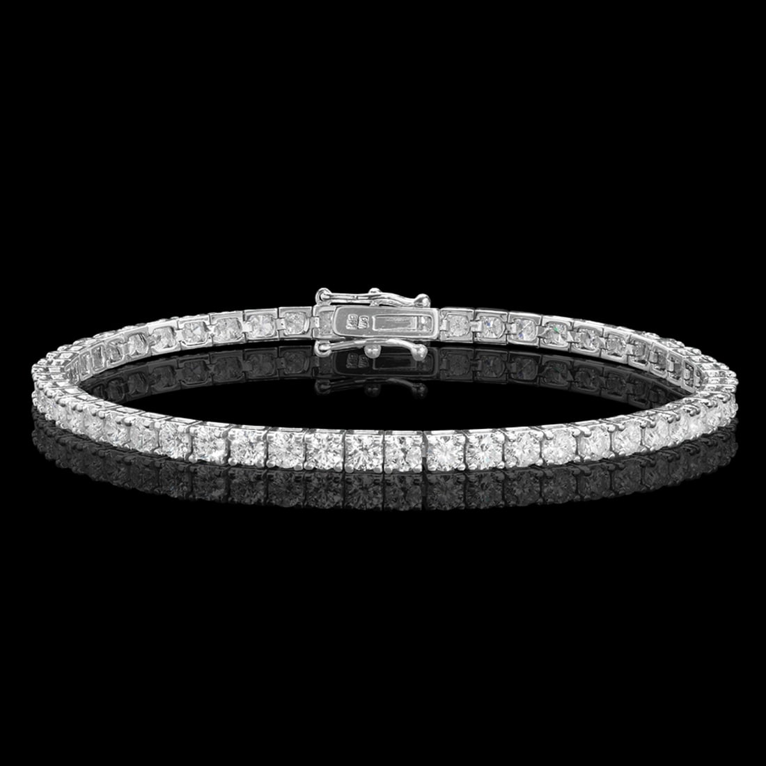 18k White Gold 5.79ct Diamond Bracelet: Retail: $22,500.00 ****** 18k White Gold 5.79ct Diamond Bracelet ****** Metal: 18K White Gold / Total Item Weight: 12.7 grams / Country Made: United States / / Main Stone: Diamond / Carat Total Weight