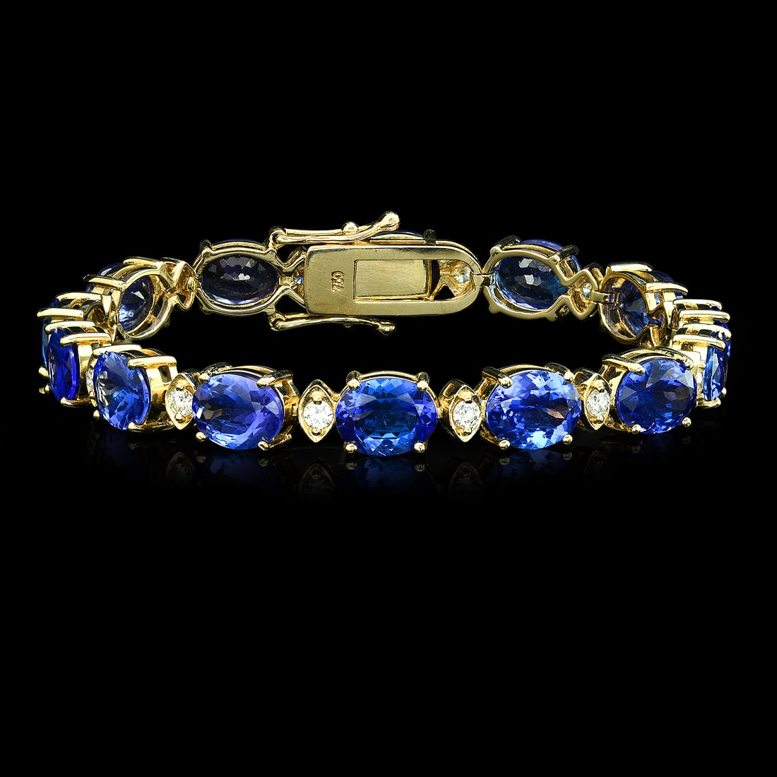 14K Yellow Gold 25.84ct Tanzanite and 1.40ct Diamond Bracelet: Retail: $48,350.00 ****** 14K Yellow Gold 25.84ct Tanzanite and 1.40ct Diamond Bracelet ****** Metal: 14K Yellow Gold / Total Item Weight: 23.6 Grams / Country Made: United States / / Main Stone: Tanz