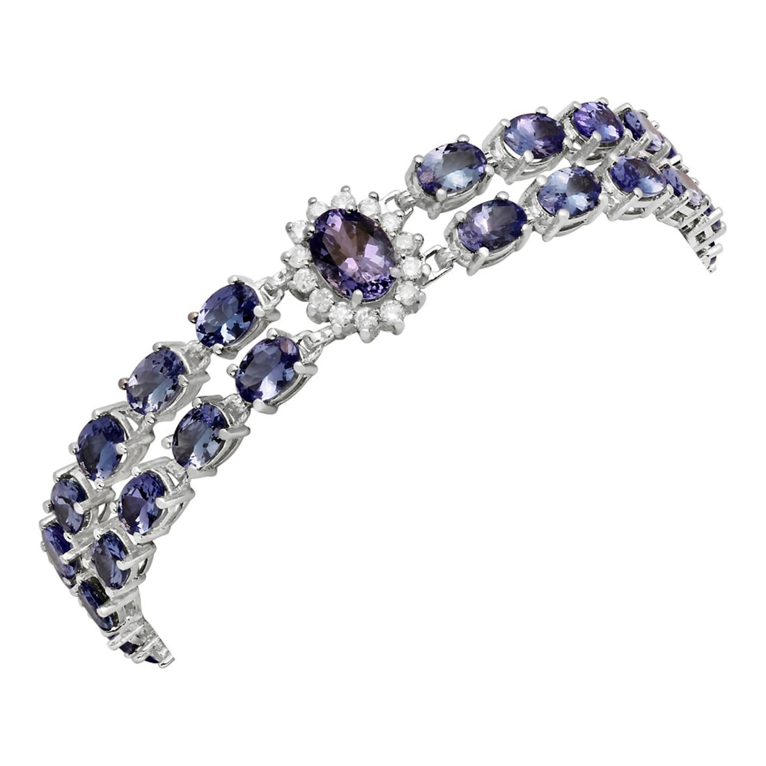 14k White Gold 17.96ct Tanzanite 1.31ct Diamond Bracelet: Retail: $14,450.00 ****** 14k White Gold 17.96ct Tanzanite 1.31ct Diamond Bracelet ****** Metal: 14K White Gold / Total Item Weight: 23.60 grams / Country Made: United States / / Main Stone: Tanzanite