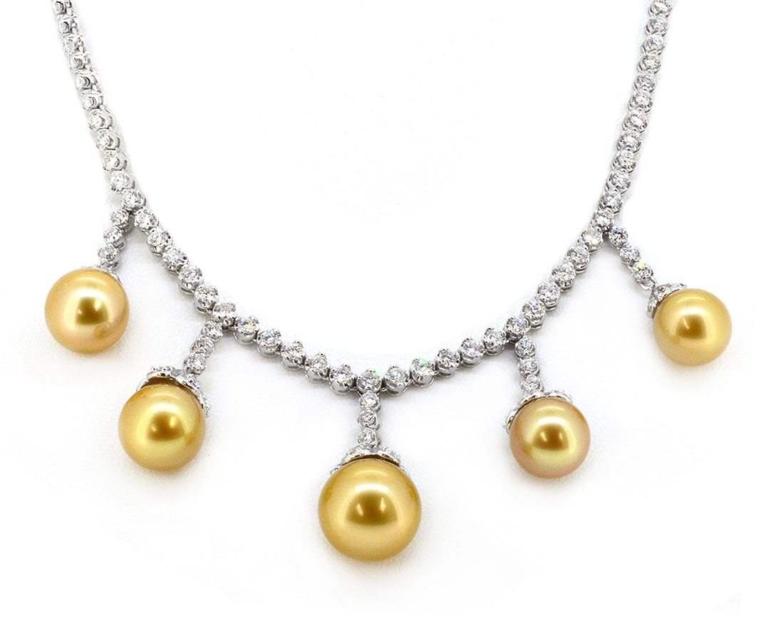 18K White Gold Ladies Necklace with 5 Golden South Sea Pearls and 6.29ct tw Adjacent Diamonds: Retail: $29,000.00 ****** 18K White Gold Ladies Necklace with 5 Golden South Sea Pearls and 6.29ct tw Adjacent Diamonds ****** Size: 17 / Metal: 18K White Gold / Total Item Weight: 35.8 Grams /