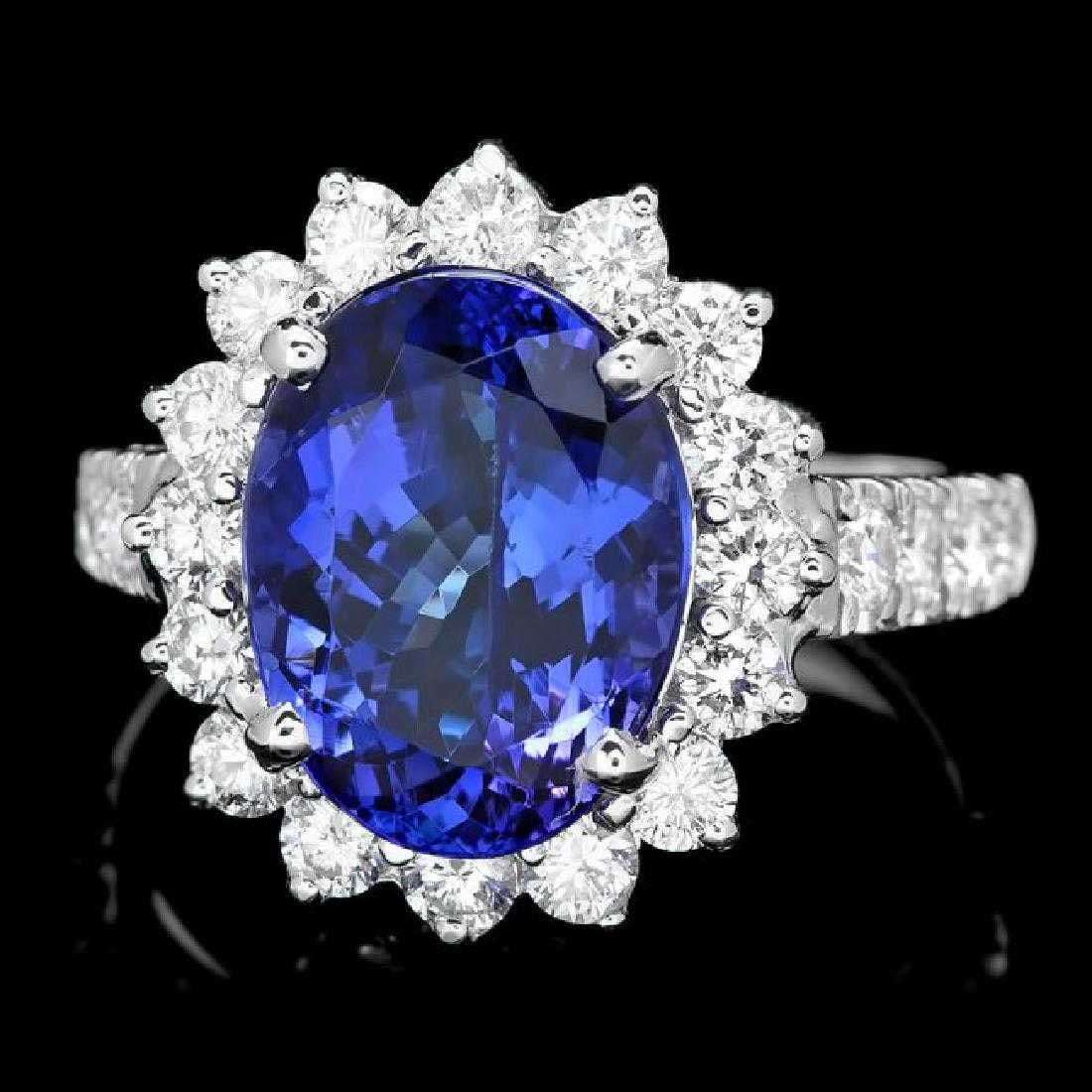 14K White Gold 6.78ct Tanzanite and 1.43ct Diamond Ring: Retail: $16,225.00 ****** 14K White Gold 6.78ct Tanzanite and 1.43ct Diamond Ring ****** Metal: 14K White Gold / Total Item Weight: 7.0 Grams / Country Made: United States / / Main Stone: Tanzanite / 