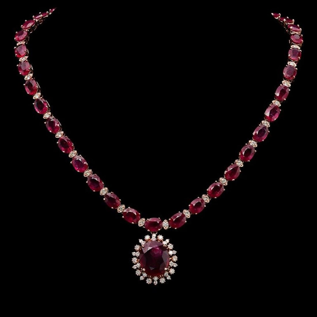 14K Gold 67.74ct Ruby & 2.48ct Diamond Necklace: Retail: $32,240.00 ****** 14K Gold 67.74ct Ruby & 2.48ct Diamond Necklace ****** Metal: 14K Solid Rose Gold / Total Item Weight: 39.7 grams / Country Made: United States / / Main Stone: Ruby / Color: 
