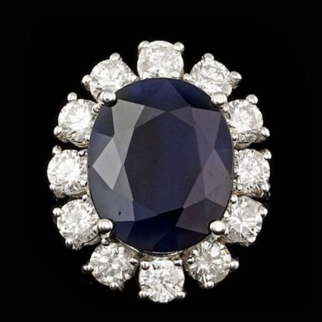 14K White Gold 8.19ct Sapphire and 1.72ct Diamond Ring: Retail: $15,700.00 ****** 14K White Gold 8.19ct Sapphire and 1.72ct Diamond Ring ****** Metal: 14K White Gold / Total Item Weight: 8.0 Grams / Country Made: United States / / Main Stone: Sapphire /
