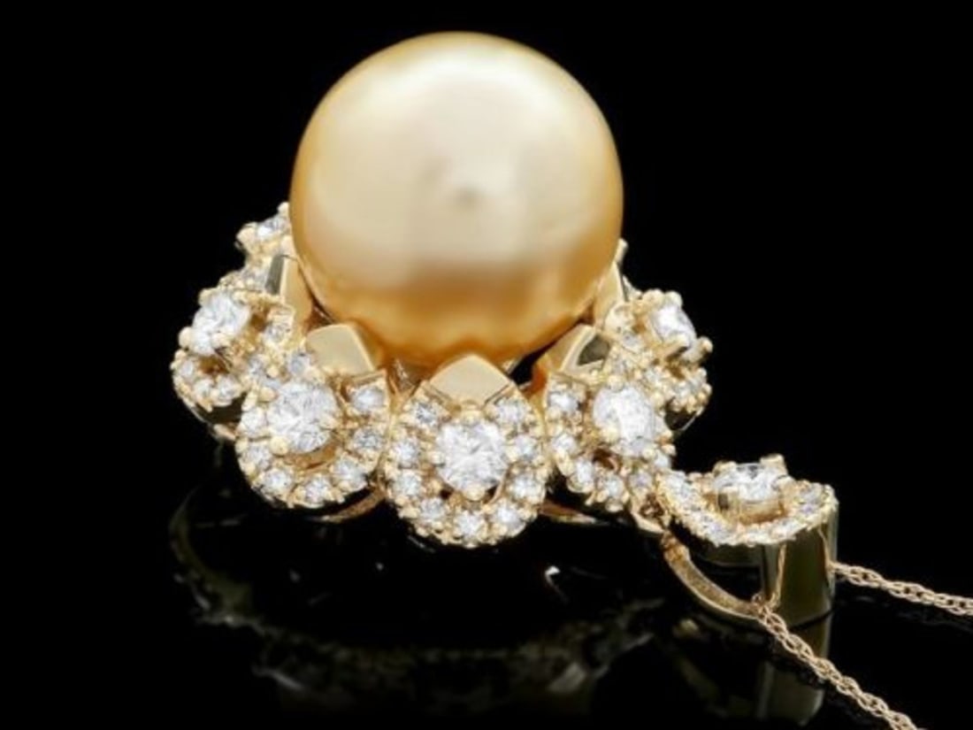 14K Gold South Sea Pearl and Diamond Pendant: Retail: $12,650.00 ****** 14K Gold South Sea Pearl and Diamond Pendant ****** Metal: 14K Yellow Gold / Total Item Weight: 16.5 Grams / Country Made: United States / / Main Stone: Pearl / Color: Gold /