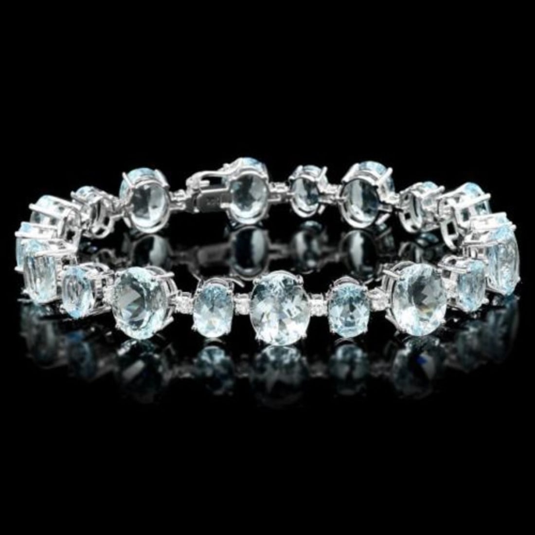 14K Gold 39.22ct Aquamarine 1.29ct Diamond Bracelet: Retail: $19,700.00 ****** 14K Gold 39.22ct Aquamarine 1.29ct Diamond Bracelet ****** Metal: 14K White Gold / Total Item Weight: 25.0 Grams / Country Made: United States / / Main Stone: Aquamarine /
