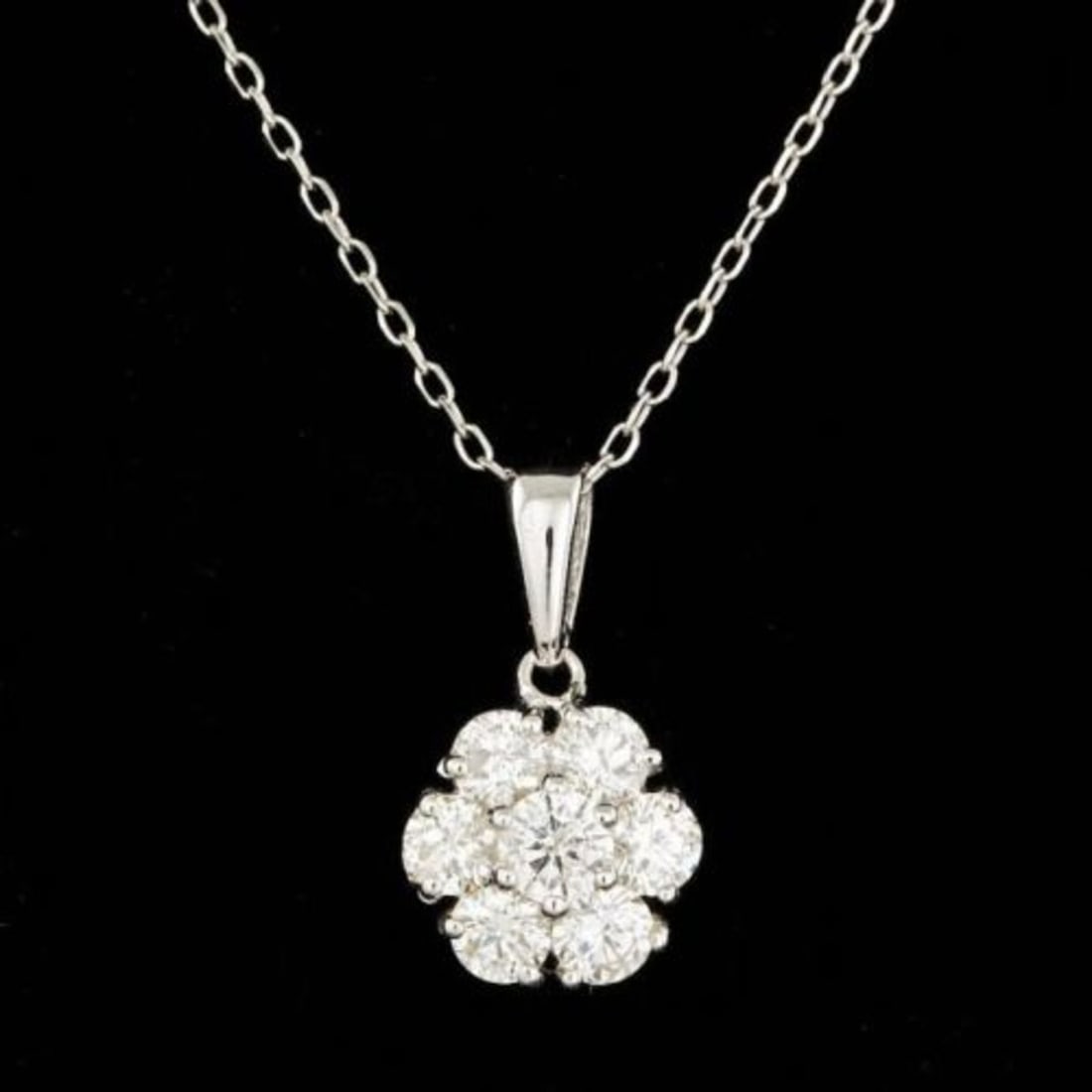 14K Gold 0.97ct Diamond Pendant: Retail: $5,771.00 ****** 14K Gold 0.97ct Diamond Pendant ****** Metal: 14K White Gold / Total Item Weight: 2.0 Grams / Country Made: United States / / Main Stone: Diamond / Carat Total Weight: 0.97 /