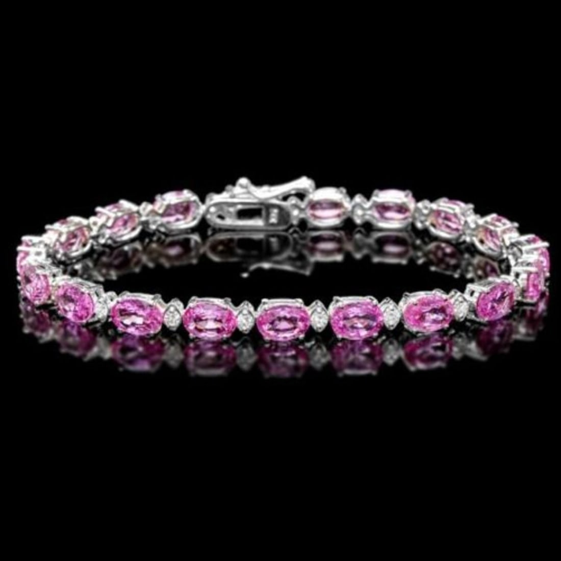 14K Gold 15.84ct Sapphire 0.66ct Diamond Bracelet: Retail: $22,675.00 ****** 14K Gold 15.84ct Sapphire 0.66ct Diamond Bracelet ****** Metal: 14k White Gold / Total Item Weight: 11.0 Grams / Country Made: United States / / Main Stone: Sapphire /