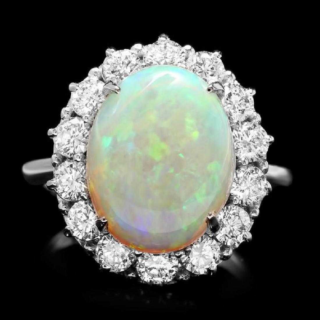 14K White Gold 4.36ct Opal and 1.33ct Diamond Ring: Retail: $27,375.00 ****** 14K White Gold 4.36ct Opal and 1.33ct Diamond Ring ****** Metal: 14K White Gold / Total Item Weight: 6.5 Grams / Country Made: United States / / Main Stone: Opal / Color: