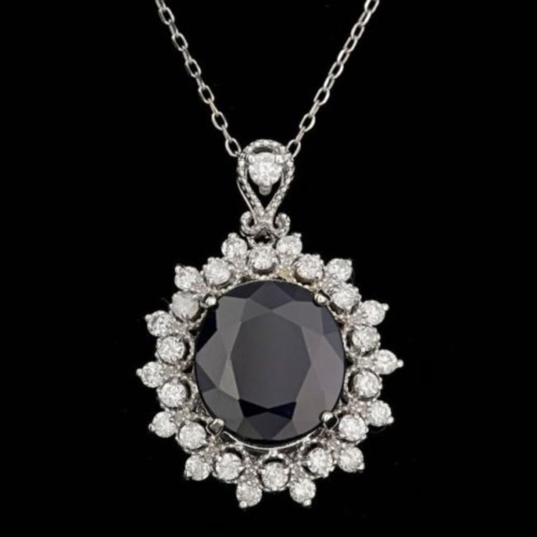14K Gold 6.91ct Sapphire 0.88ct Diamond Pendant: Retail: $9,000.00 ****** 14K Gold 6.91ct Sapphire 0.88ct Diamond Pendant ****** Metal: 14K White Gold / Total Item Weight: 6.0 Grams / Country Made: United States / / Main Stone: Sapphire / Color: Blu