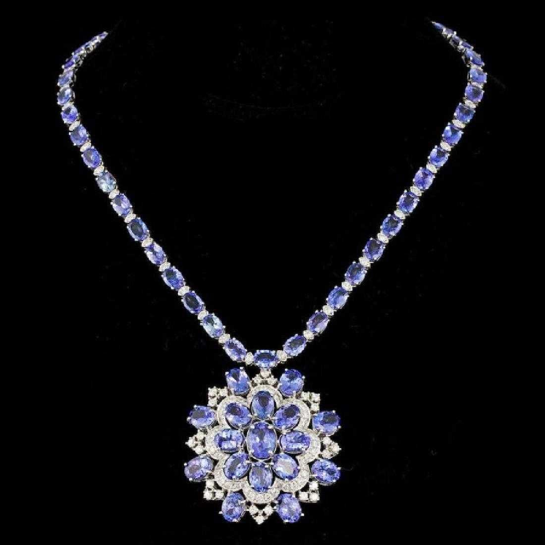 14K White Gold 52.90ct Tanzanite and 5.14ct Diamond Necklace: Retail: $60,660.00 ****** 14K White Gold 52.90ct Tanzanite and 5.14ct Diamond Necklace ****** Metal: 14K White Gold / Total Item Weight: 44.0 Grams / Country Made: United States / / Main Stone: