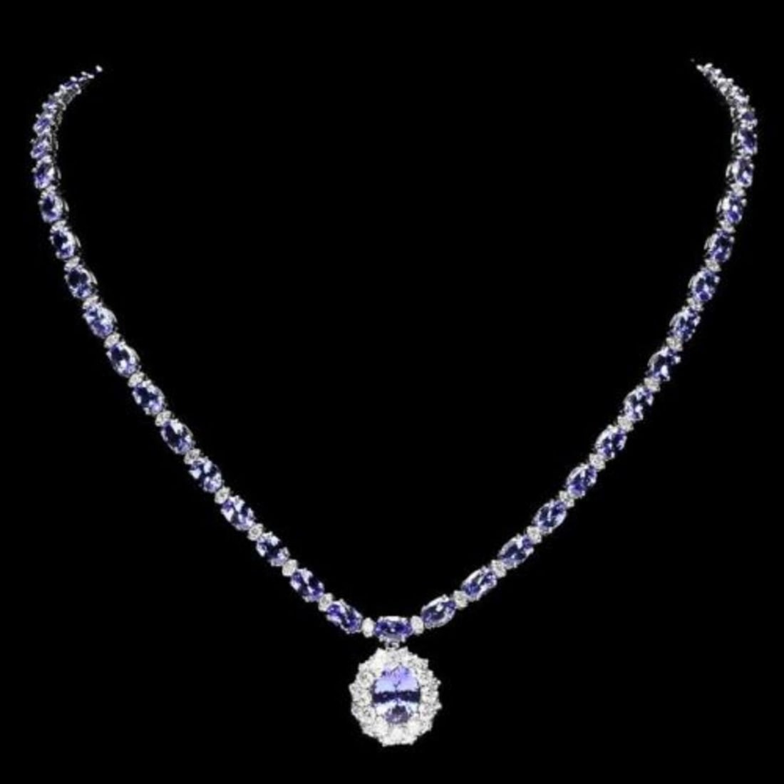 14K White Gold 26.37ct Tanzanite and 2.77ct Diamond Necklace: Retail: $24,864.00 ****** 14K White Gold 26.37ct Tanzanite and 2.77ct Diamond Necklace ****** Metal: 14K White Gold / Total Item Weight: 26.5 Grams / Country Made: United States / / Main Stone: Tanzan