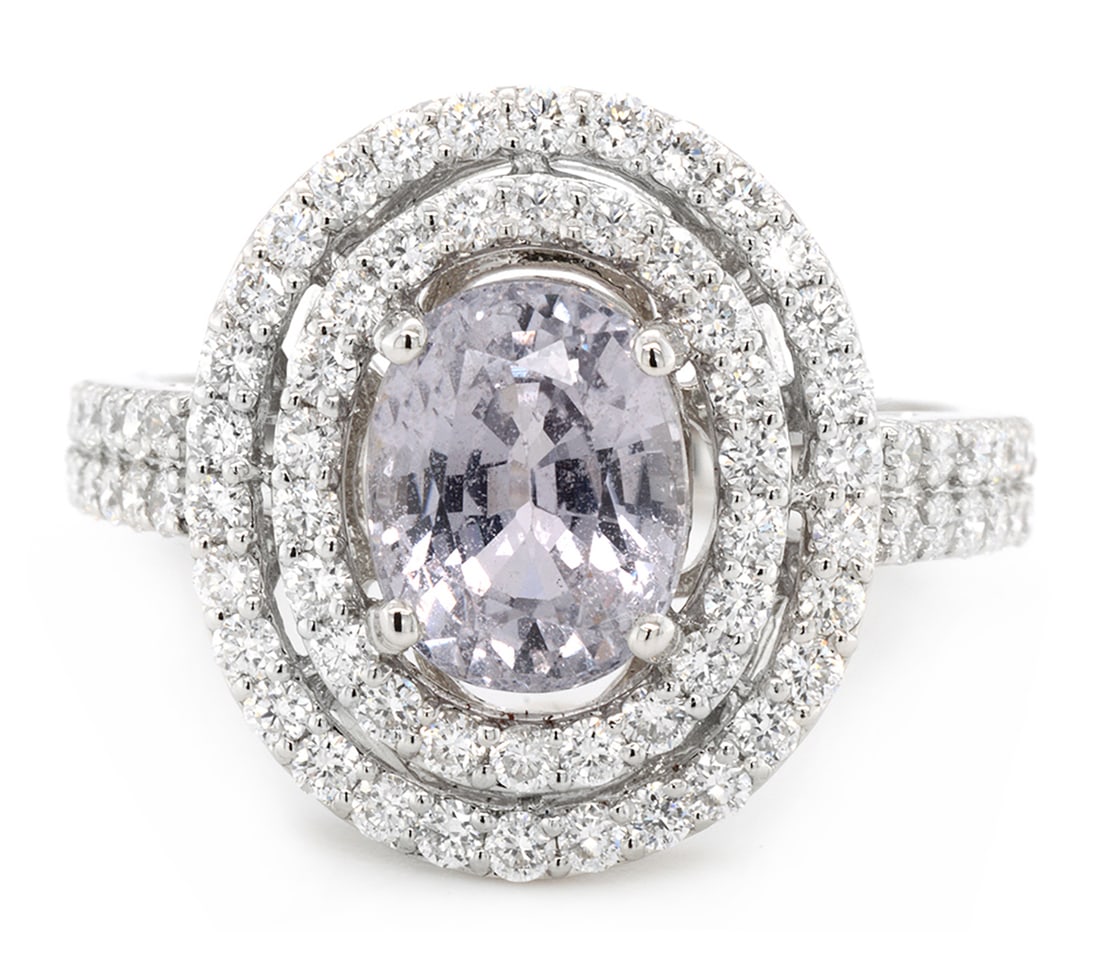 18K White Gold Ladies Ring with 2.75 Natural Sapphire and 0.94ct tw Adjacent Diamonds: Retail: $7,500.00 ****** 18K White Gold Ladies Ring with 2.75 Natural Sapphire and 0.94ct tw Adjacent Diamonds ****** Size: 6.5 / Metal: 18K White Gold / Total Item Weight: 4.5 Grams / Country Made: U