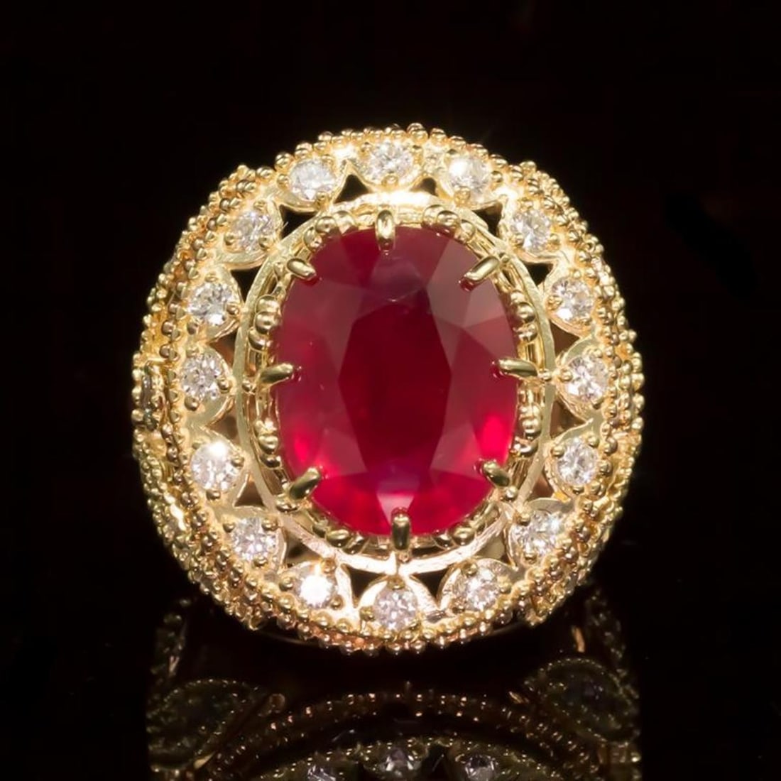 14K Yellow and Rose Gold 13.83ct Ruby and 2.40ct Diamond Ring: Retail: $13,300.00 ****** 14K Yellow and Rose Gold 13.83ct Ruby and 2.40ct Diamond Ring ****** Metal: 14K Yellow and Rose Gold / Total Item Weight: 19.1 Grams / Country Made: United States / / Main St