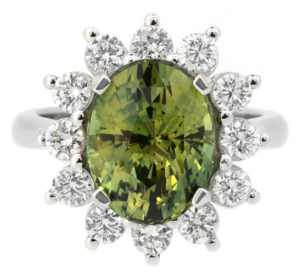 18K White Gold Ladies Ring with 5.90ct GIA Certified Sapphire and 1.0ct tw Adjacent Diamonds: Retail: $22,500.00 ****** 18K White Gold Ladies Ring with 5.90ct GIA Certified Sapphire and 1.0ct tw Adjacent Diamonds ****** Size: 6.5 / Metal: 18K White Gold / Total Item Weight: 8.4 / Country