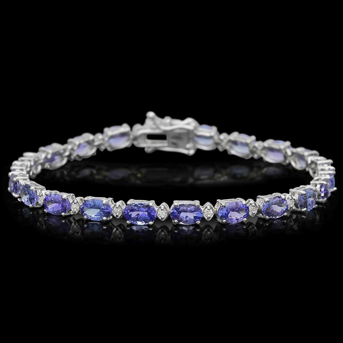14K Gold 9.52ct Tanzanite 0.44ct Diamond Bracelet: Retail: $8,100.00 ****** 14K Gold 9.52ct Tanzanite 0.44ct Diamond Bracelet ****** Metal: 14K Solid Gold / Total Item Weight: 8.8 grams / Country Made: United States / / Main Stone: Tanzanite / Color: 